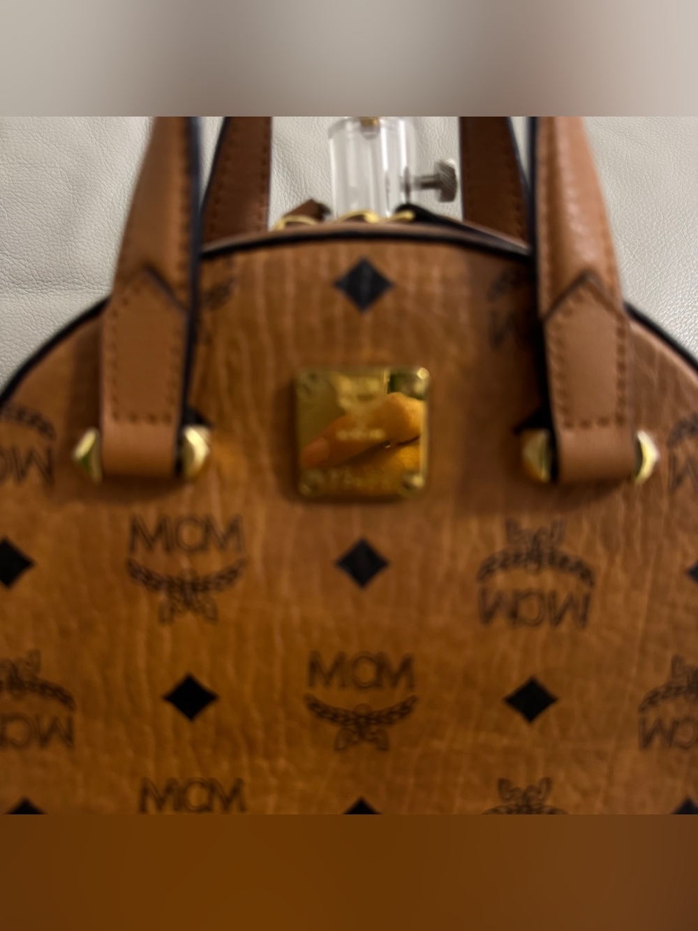 MCM Cognac mini half moon bag